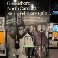 Pediatric Dentistry dental assistant Kamara Horton, honors her grandfather, William “Billy” Smith (third from left), who participated in the Greensboro lunch counter sit-in in 1960.