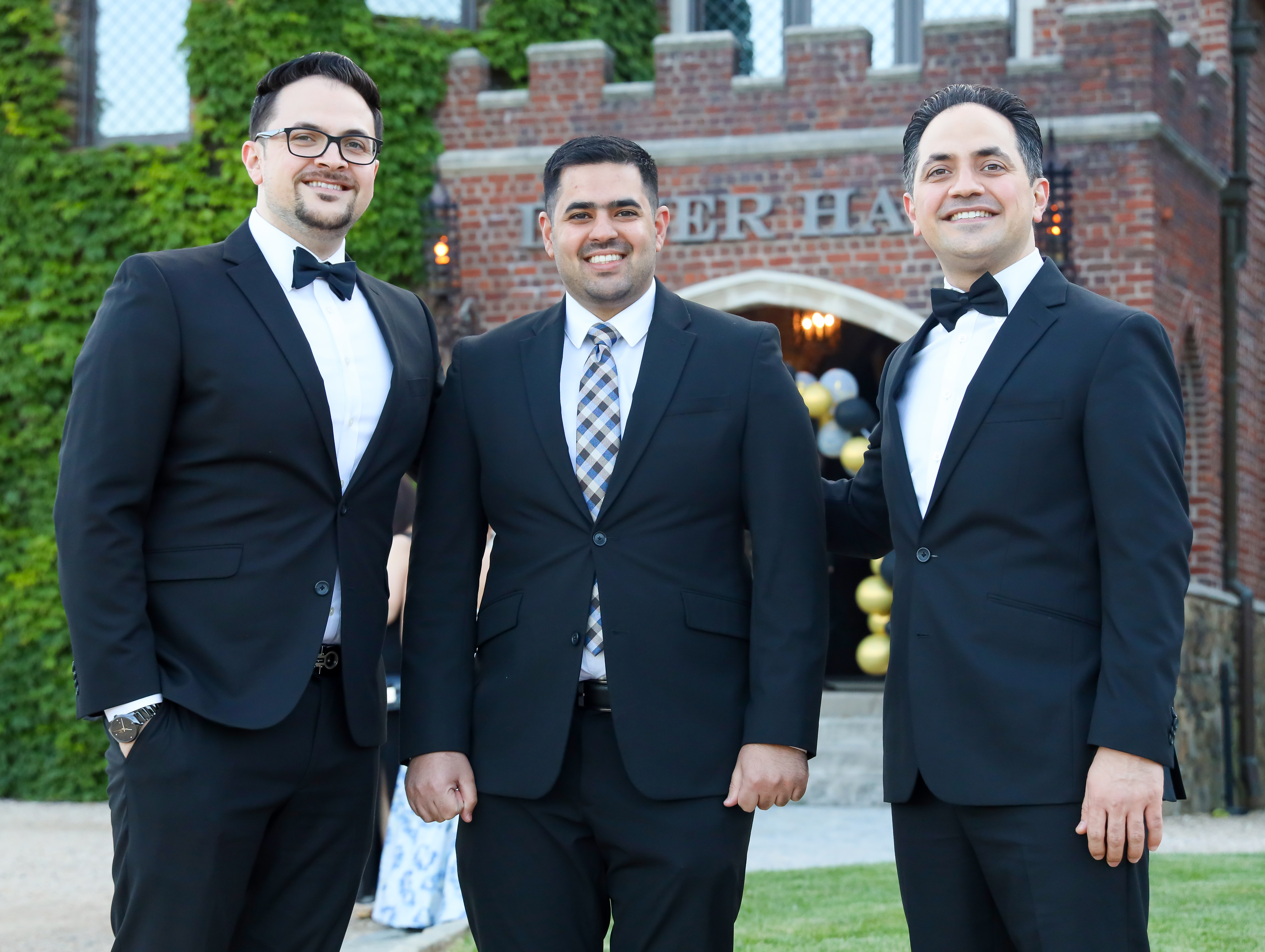 Smadi (center) pictured with Awab A. Abdulmajeed, D.D.S., (left) and Aous A. Abdulmajeed, D.D.S, Ph.D. (right), two of his mentors at the VCU School of Dentistry. (John Wallace School of Dentistry)