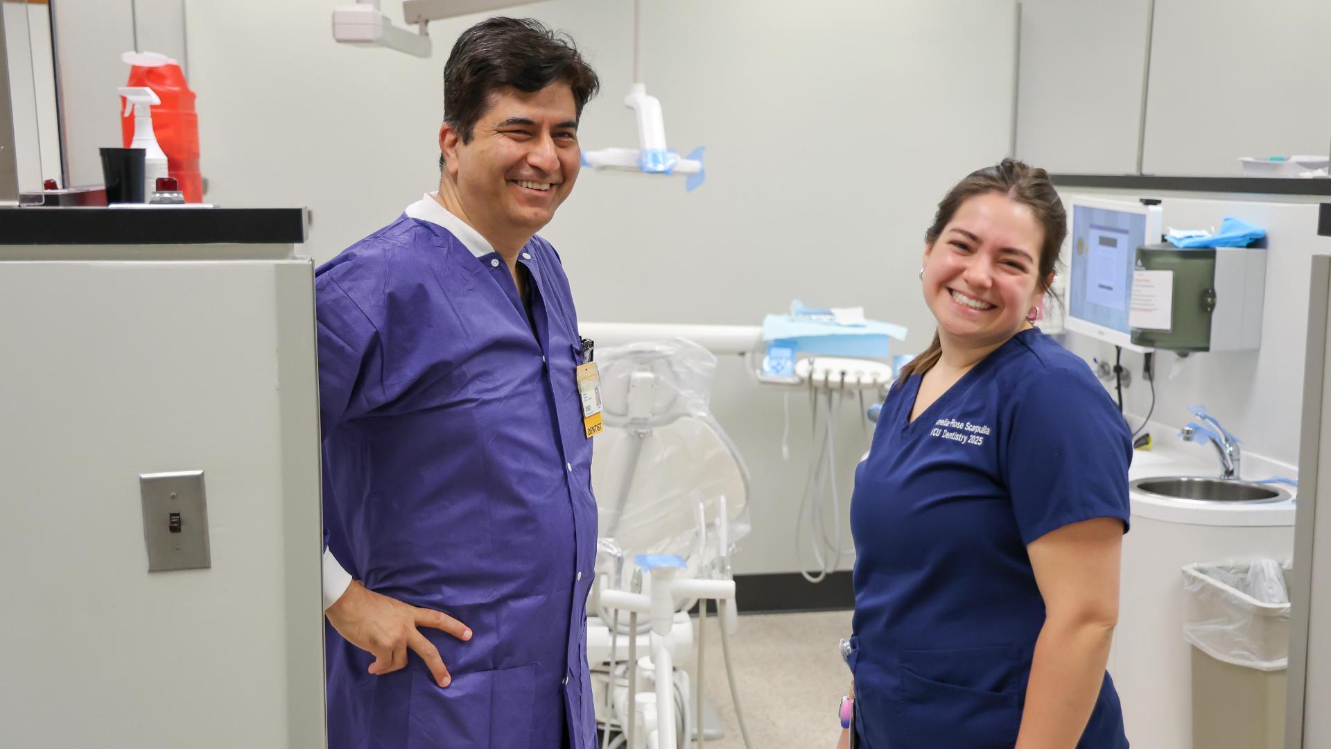 Dental Student and faculty in clinic