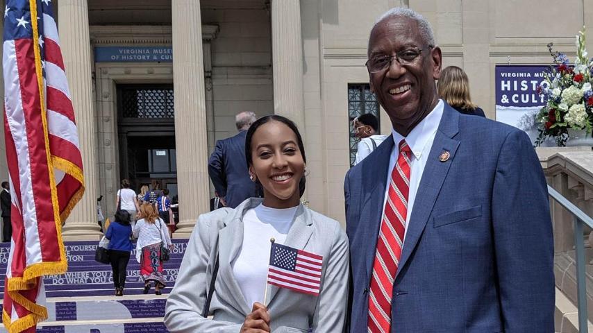 Ibrahim poses next to Congressman Donald McEachin during a naturalization ceremony at the Virginia Museum of History & Culture on July 4, 2019.