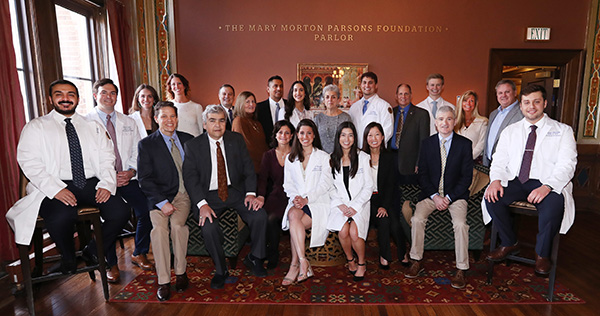 Legacy Lunch participants gather for a group photo with Dr. Clara Sptafore, interim dean of VCU School of Dentistry.