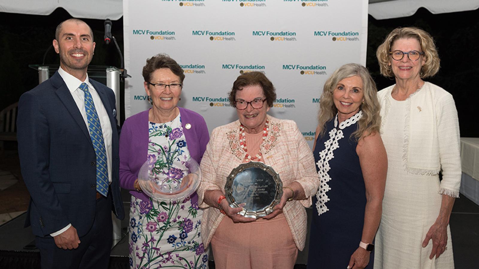 Louis Formica, D.D.S. (from left); Barbie Dunn, Ph.D.; Becky Perdue; Bronwyn Burnham; and Ellen Byrne, D.D.S., Ph.D., share a moment at the MCV Foundation's annual awards dinner. (MCV Foundation)