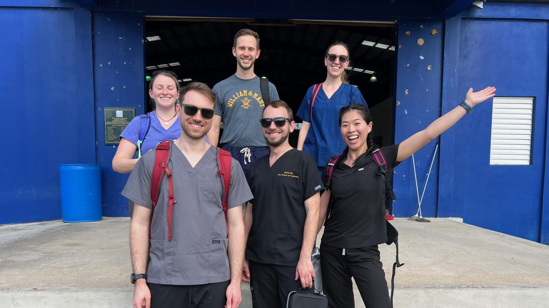 In April 2023, Adzima (bottom left) and Quinnie Phan (bottom right) participated in a mission trip to Belize. There, they provided oral healthcare to a local village.